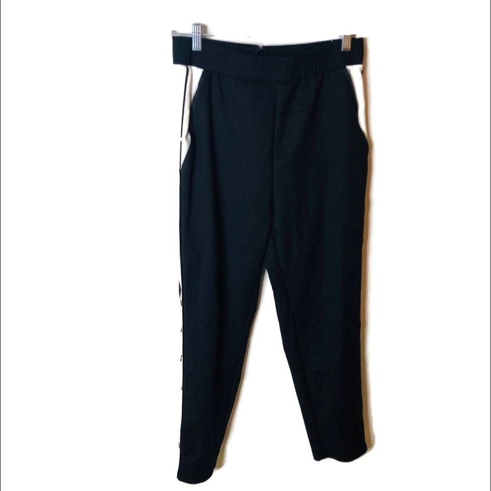 Celebrity fashion pants size medium. Side stripes.